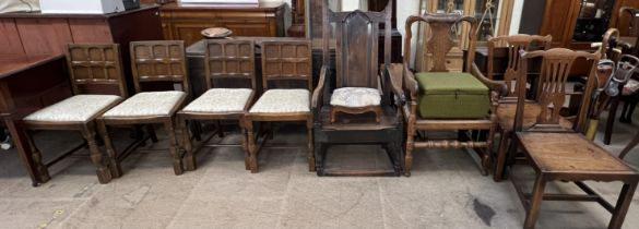 An 18th century oak elbow chair together with two George III dining chairs, an 18th century chair,