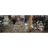 Various glass sundae dishes together with stainless steel pictures, pottery flower, figures,