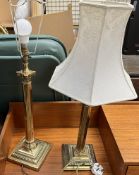 Two brass corinthian column candlestick table lamps