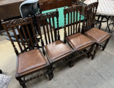 A set of four 20th century oak dining chairs with barley twist back