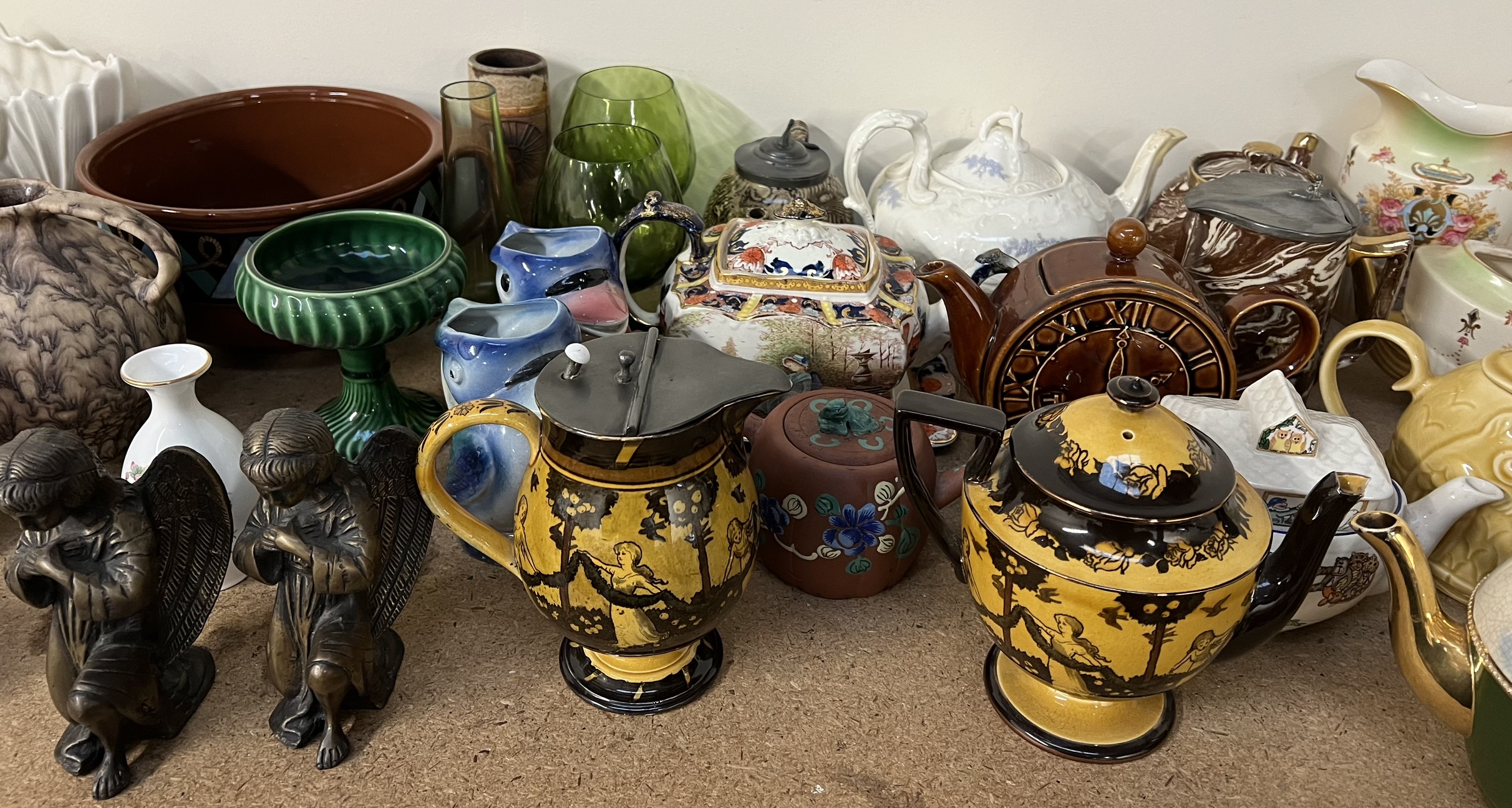 A Doulton Burslem Morrisian pottery teapot and hot water jug together with a collection of teapots, - Image 3 of 4