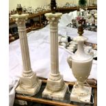 A pair of Corinthian column "Marble" candlestick style lamps and a "Marble" urn table lamp