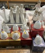 A Lladro swan together with assorted LLadro figures,