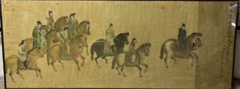 A Chinese scroll picture depicting figures on horseback,