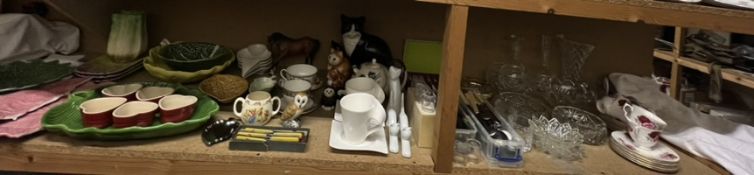 A large lot comprising pottery dishes, Beswick horse, flatwares, part tea set,