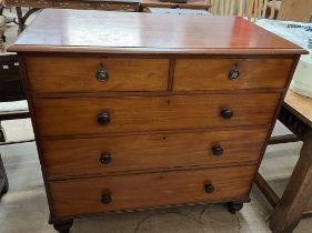 A 19th century mahogany chest with a rectangular top above two short and three long drawers on