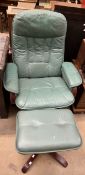 A green leather upholstered armchair and matching foot stool