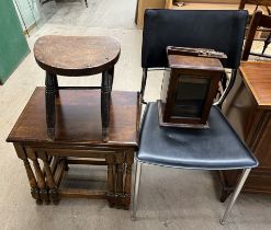 A nest of three oak tables together with a milking stool, dining chair,