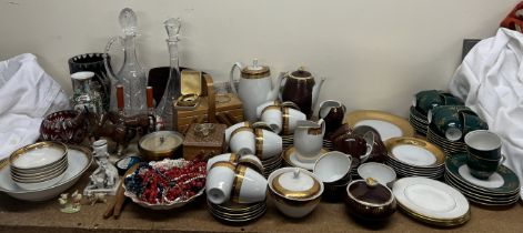 A brass cased barometer together with glass decanters, a Polish part tea service, other part sets,