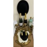 A bowler hat together with a gilt wall mirror, pair of gilt wall lights, Lanson champagne,