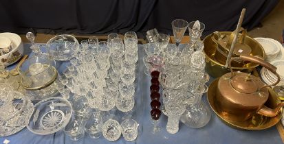 Crystal decanters together with drinking glasses, glass bowls, copper kettle,