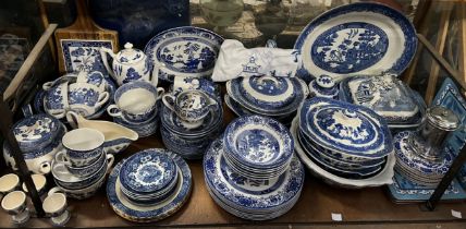 Assorted Willow pattern pottery tureens, plates, jugs, egg cups,