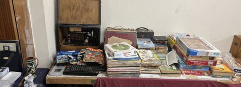 A large lot including a Singer sewing machine and classical records, together with a ZX Spectrum,