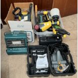Assorted tools including saws, lights,