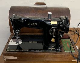 A Singer 201K sewing machine,