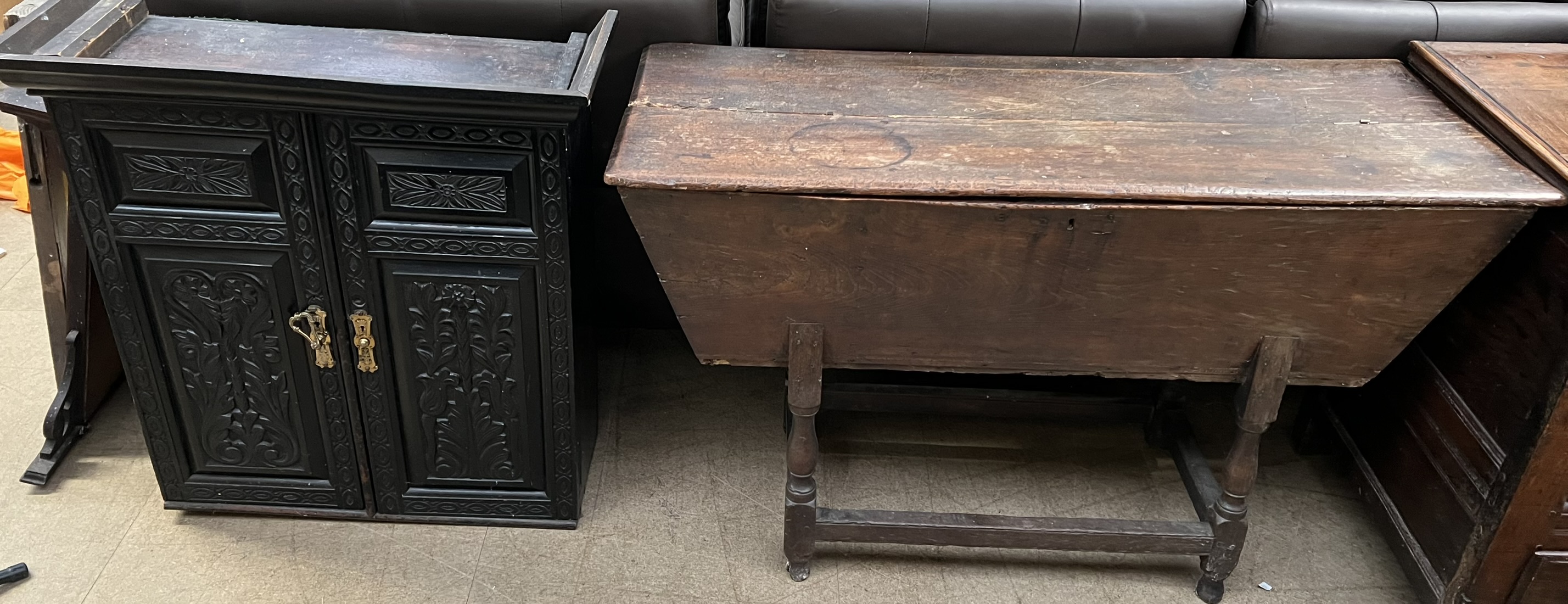 A dough bin together with a carved ebonised cabinet