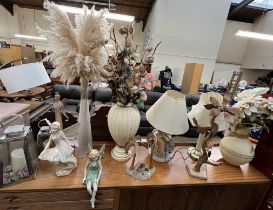Assorted table lamps together with angel figures, vases,