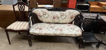 An Edwardian mahogany two seater salon settee together with a dining chair and a carved low chair