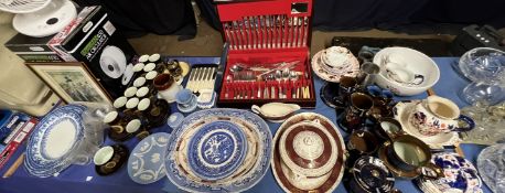 An Oneida cased part flatware service together with blue and white meat plate, other plates,