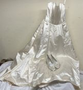 A Jasper Conran wedding dress together with a pair of Gabriella & Lucido shoes