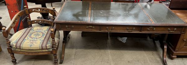A Regency style mahogany centre table with three leather inset panels and three drawers and