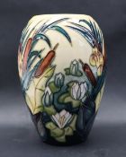 A Moorcroft pottery vase decorated in the Bullrushes pattern, impressed and painted marks,