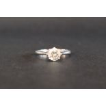 A solitaire diamond ring set with a round brilliant cut diamond, approximately 0.