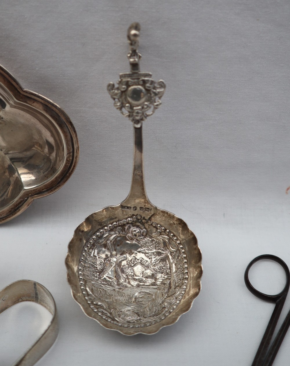 An Edward VII silver lobed dish, London, 1909 together with silver sugar nips, silver ladle, - Image 3 of 5