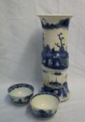 A Chinese porcelain blue and white vase with a flared rim and knopped stem on a spreading foot,