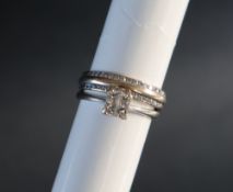 A four stone diamond ring set with princess cut diamonds to an 18ct white gold shank together with