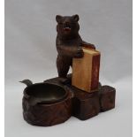 A Black Forest desk top bear matchbox holder and ashtray 12.