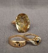 A citrine dress ring with an oval faceted citrine to a 9ct gold setting and shank, size M,