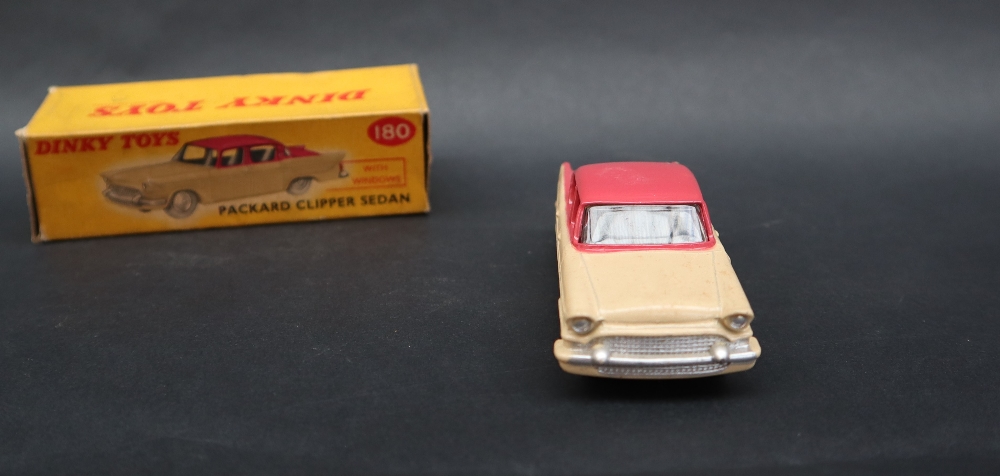 A Dinky Toys 180 Packard Clipper Sedan with windows having a cerise upper body, - Image 3 of 5