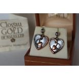 A pair of Clogau yellow and white metal mother of pearl set heart shaped earrings