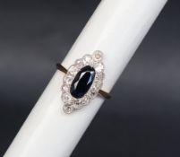 A sapphire and diamond ring,