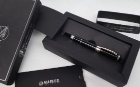 A Marlen Elegance Le Reve fountain pen, black body with white metal band,