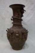 An Oriental bronze vase,