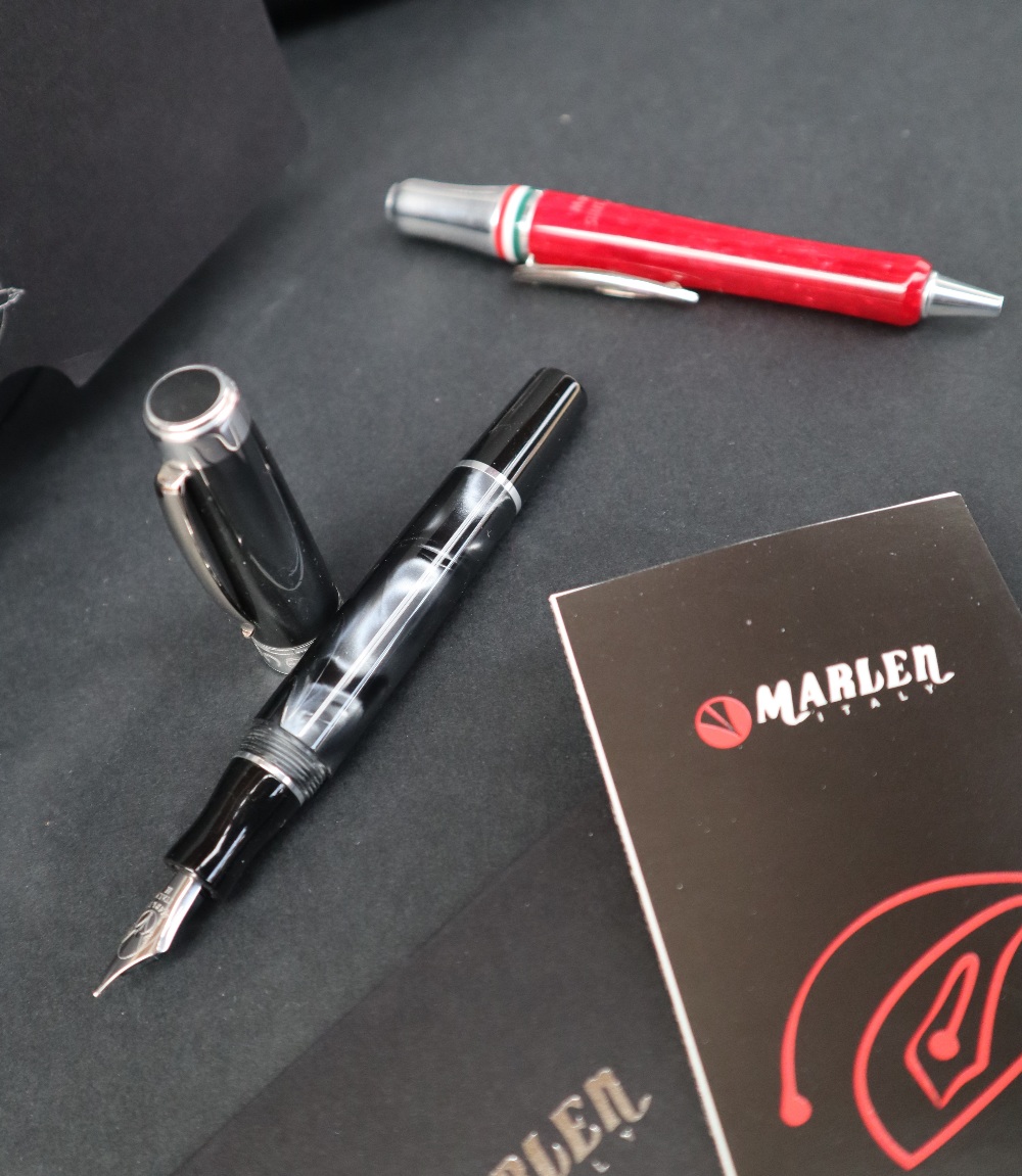 A Marlen One fountain pen, with a black pearlescent body,