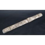 A Japanese carved bone tanto, decorated with figures, dragons, horsemen etc, 36.