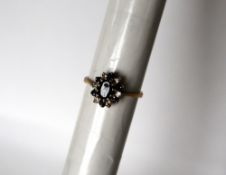 A sapphire and diamond cluster ring,