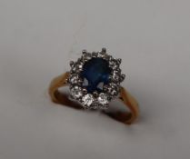 A sapphire and diamond cluster ring,