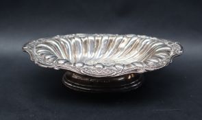 A Victorian silver pedestal dish with an embossed rim on a spreading foot, Birmingham, 1891,