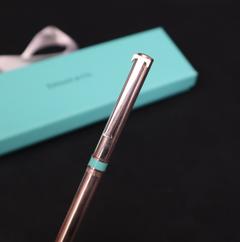 A Tiffany and Co silver ballpoint pen with T clip and turquoise band, - Image 4 of 4