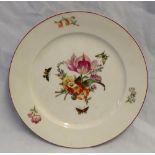 A Berlin porcelain plate with a cerise line rim decorated to the centre with a bouquet of flowers