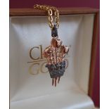 A Clogau prince of Wales feathers pendant on a 9ct gold chain,