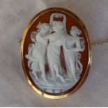 A 9ct gold mounted shell cameo brooch of the three graces,