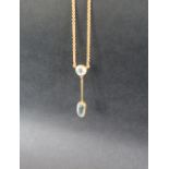 A 9ct gold aquamarine set pendant,