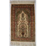 A yellow ground silk rug,