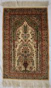 A yellow ground silk rug,