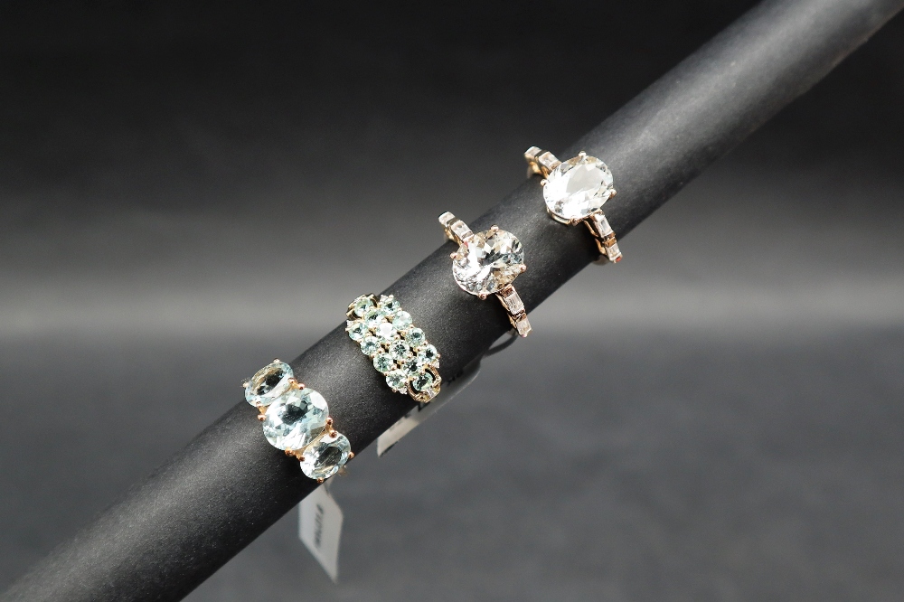 Gemporia - A 9ct gold aquamarine and white zircon ring, set with 3. - Image 2 of 6